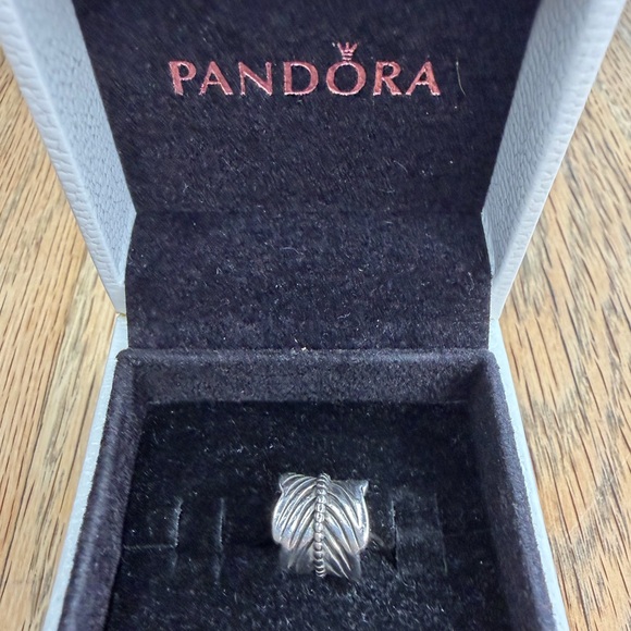 Pandora Jewelry - RETIRED Pandora Rolled Feather Leaf Charm. #790581